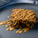 Chocolate peanut butter baked oatmeal drizzled with melted peanut butter