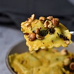 Pumpkin Pasta with Toasted hazelnuts and sage on a spoon