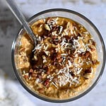 Overhead shot of overnight pumpkin pie oats with toppings