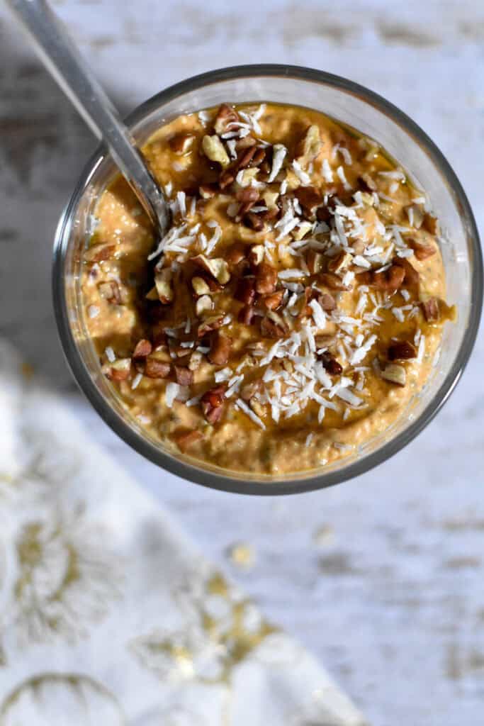 Overhead shot of overnight pumpkin pie oats with toppings