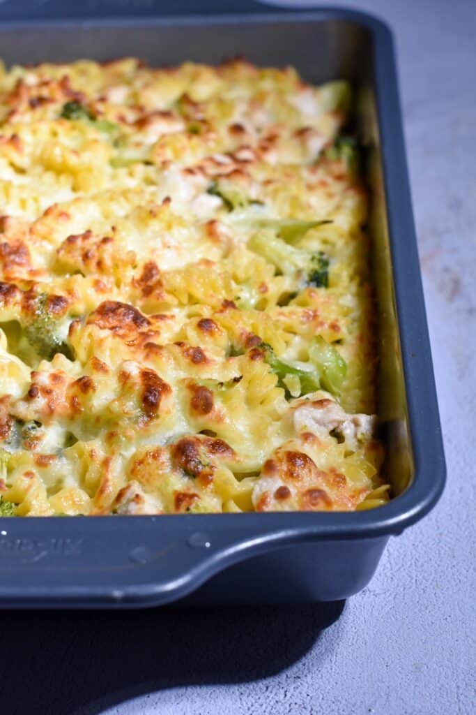 Pan of cooked lighter chicken and broccoli bake